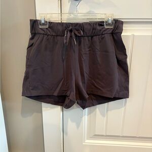 Women's Lululemon plum purple on the fly shorts